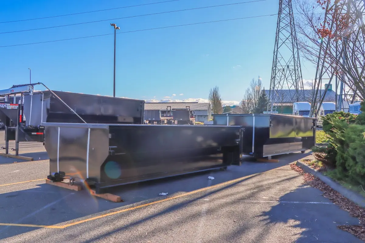 Roll-off dumpster ready for waste disposal at job site for 12 Yard Dumpster Rental in Aztec